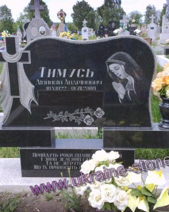 Подвійний пам'ятник із двома портретами